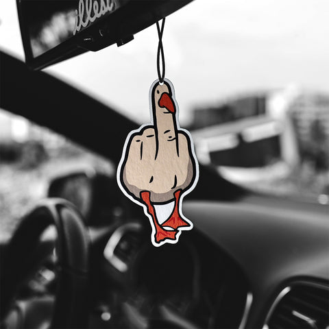 Car air freshener shaped like a hand giving the middle finger hanging from a car's rearview mirror.