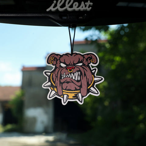Car air freshener with a bulldog design hanging from a 'illest' brand car visor.
