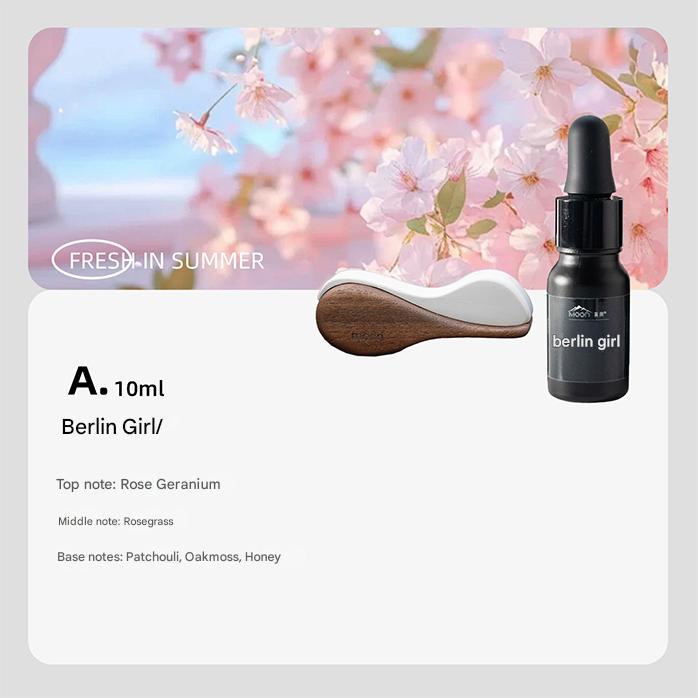 Product display with a dropper bottle labeled 'berlin girl' against a cherry blossom background.