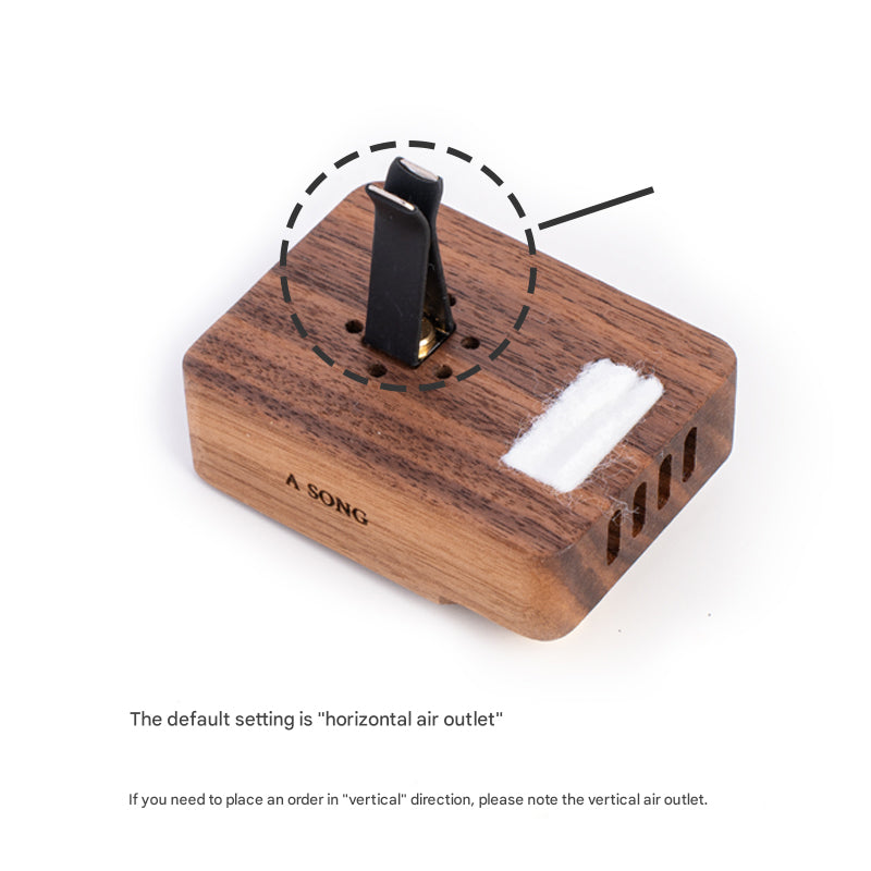 Wooden device with air outlet on a white background