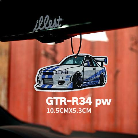 Car air freshener with a GTR-R34 design hanging from a rearview mirror.
